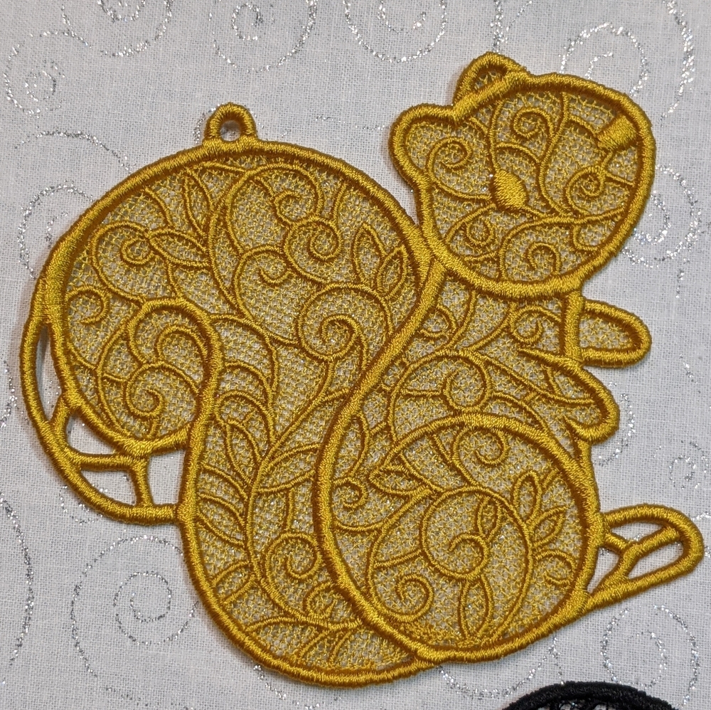 Lace embroidery critters. Hand them anywhere!